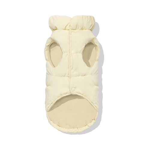 Cream dachshund puffer underside showing fleece lining and snap closure